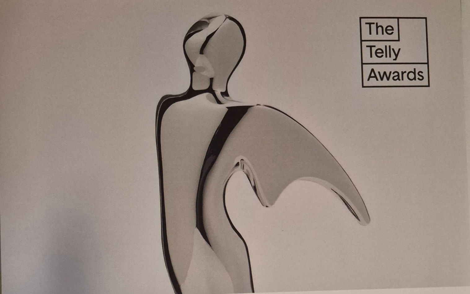 Silver statue artwork from the 2026 Telly Awards winner certificate